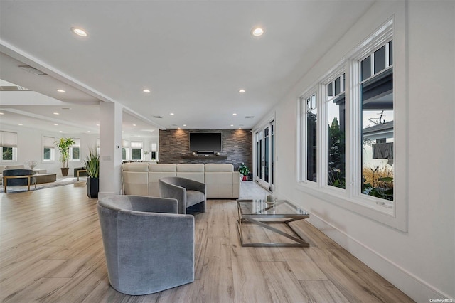 living room with light hardwood / wood-style flooring