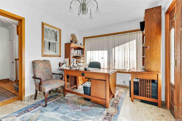 office featuring a notable chandelier and light wood-type flooring