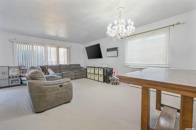 carpeted living room featuring a notable chandelier