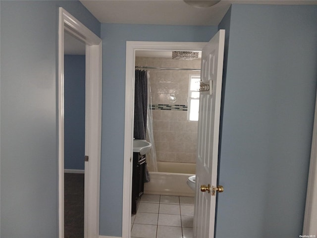 bathroom featuring shower / tub combo and tile patterned floors
