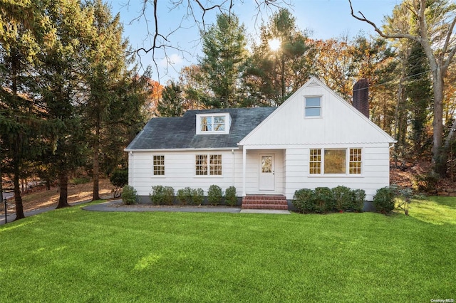 view of front of home with a front yard