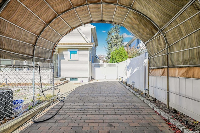 view of patio featuring a carport