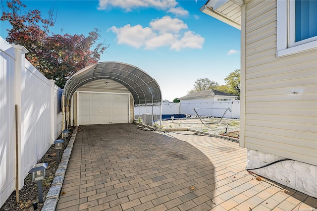 view of patio featuring an outbuilding