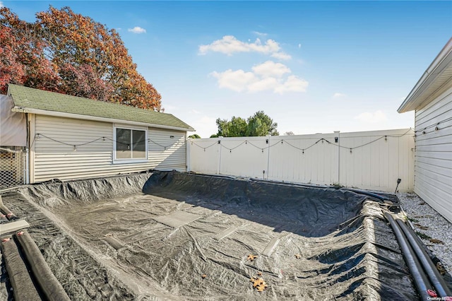 exterior space featuring a covered pool