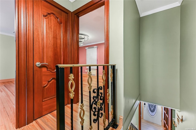 room details with hardwood / wood-style flooring and ornamental molding