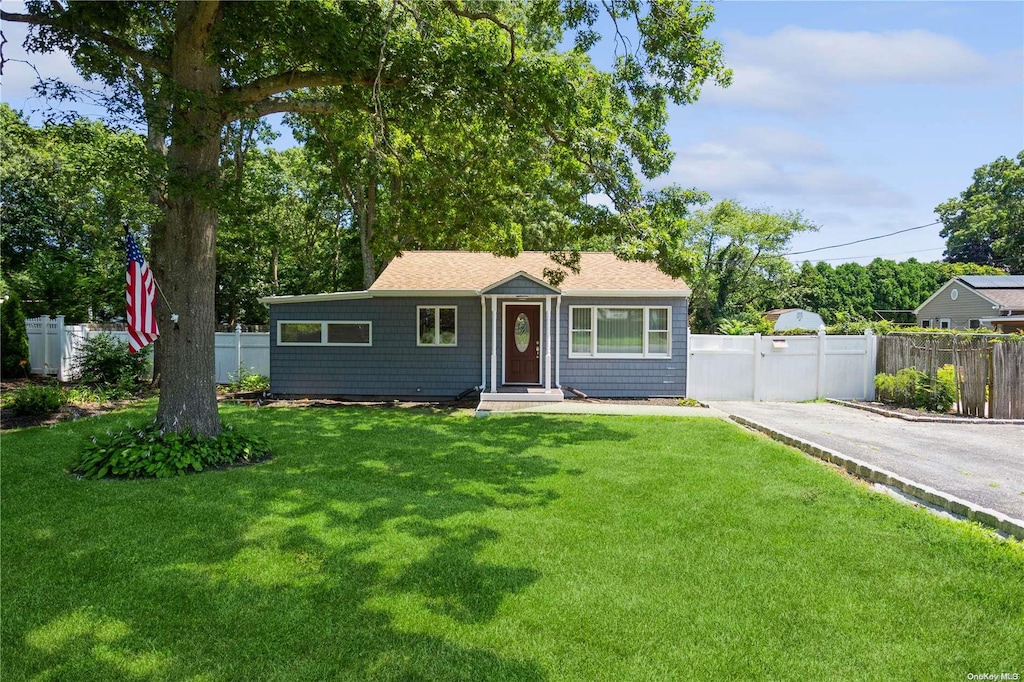 view of front of home with a front yard