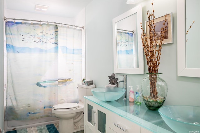 304 S Dunton Ave, East Patchogue, NY 11772 - bathroom featuring double vanity and shower / tub combo with curtain