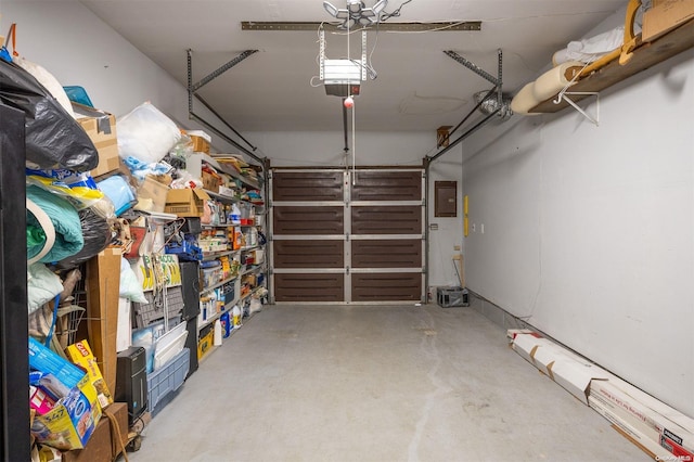 304 S Dunton Ave, East Patchogue, NY 11772 - garage with a garage door opener and electric panel