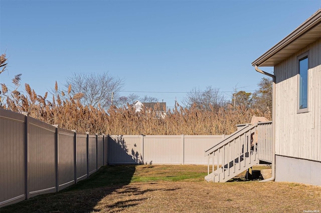 304 S Dunton Ave, East Patchogue, NY 11772 - fenced backyard featuring stairway