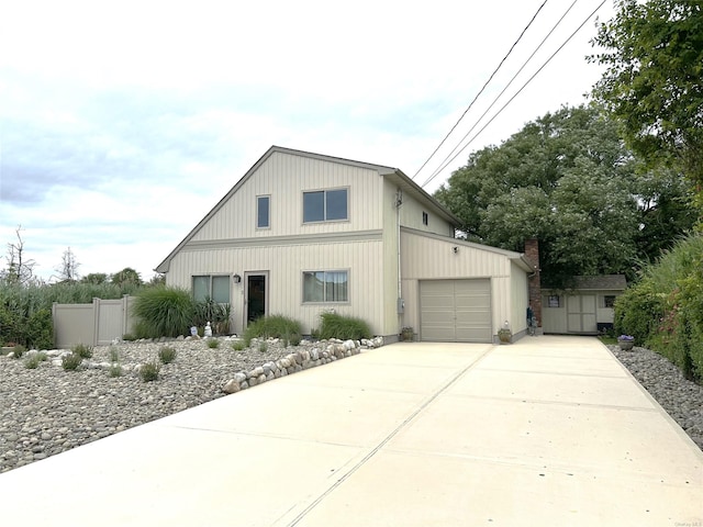 304 S Dunton Ave, East Patchogue, NY 11772 - view of front of house with driveway and a garage