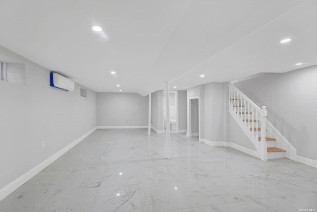 basement featuring a wall mounted AC