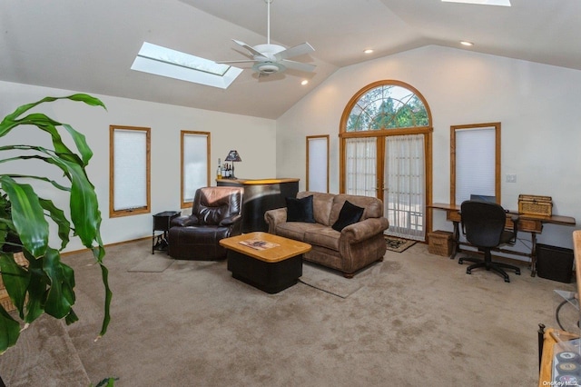 carpeted living room featuring french doors, vaulted ceiling, and ceiling fan