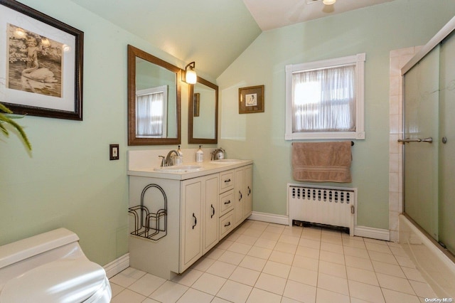 full bathroom featuring radiator heating unit, tile patterned flooring, combined bath / shower with glass door, lofted ceiling, and toilet