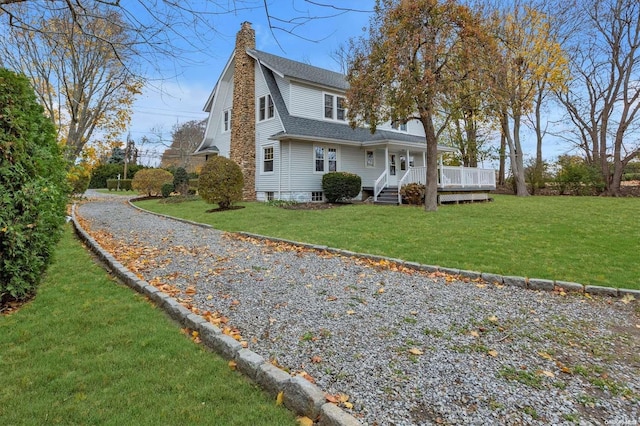 view of home's exterior with a lawn