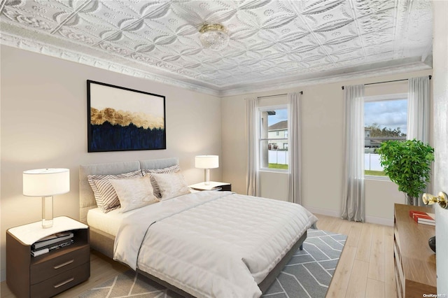 bedroom with light wood-type flooring