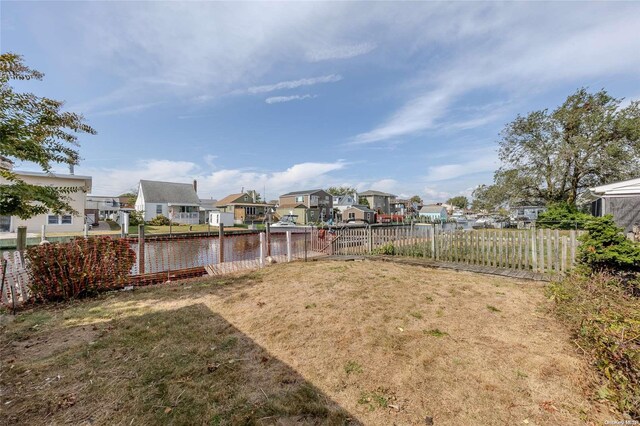 view of yard featuring a water view