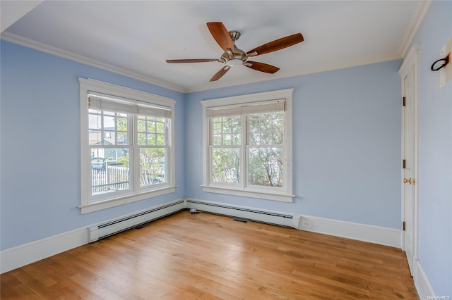 unfurnished room with ceiling fan, light wood-type flooring, ornamental molding, and a baseboard radiator