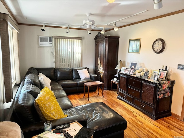 living room featuring crown molding, light hardwood / wood-style floors, rail lighting, a wall unit AC, and ceiling fan