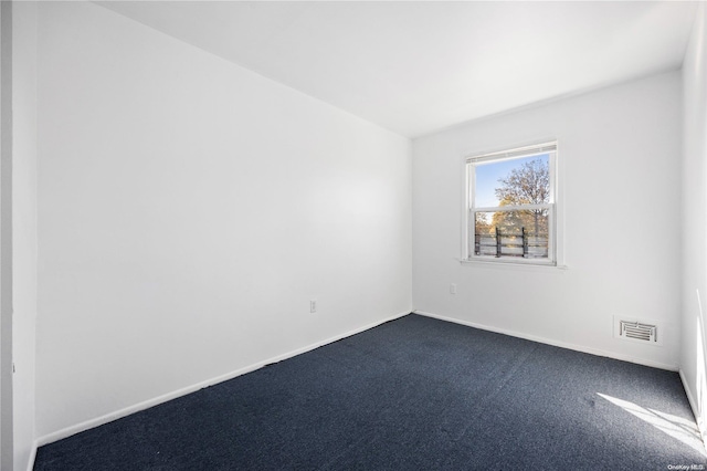 spare room with carpet flooring