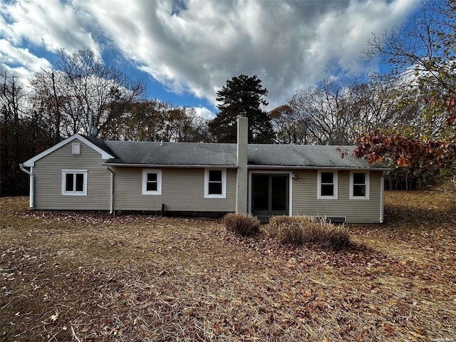2468 River Rd, Calverton, NY 11933 - back of property featuring a chimney