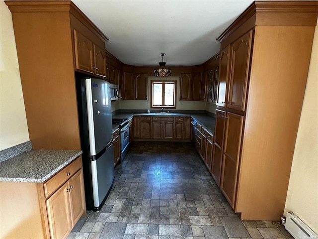 2468 River Rd, Calverton, NY 11933 - kitchen featuring appliances with stainless steel finishes, a baseboard radiator, a sink, and stone finish floors