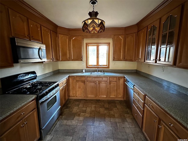 2468 River Rd, Calverton, NY 11933 - kitchen featuring stainless steel appliances, a sink, dark stone finish flooring, decorative light fixtures, and brown cabinetry