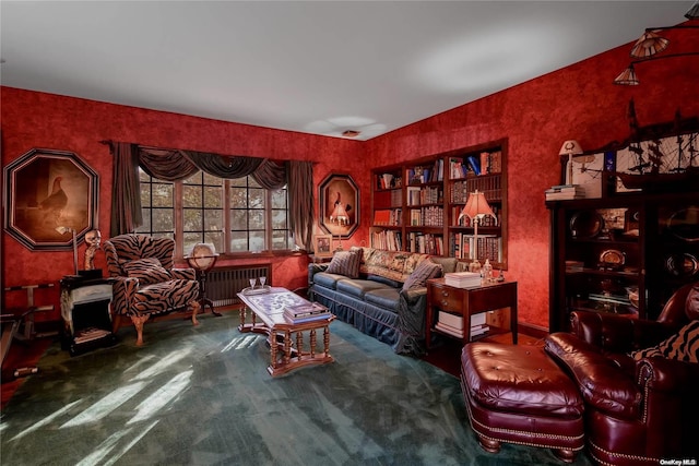 sitting room with radiator heating unit and carpet flooring