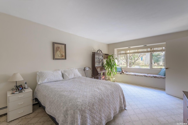 bedroom featuring a baseboard radiator