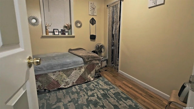 bedroom featuring hardwood / wood-style floors