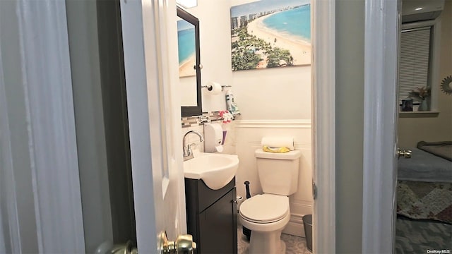 bathroom with vanity and toilet