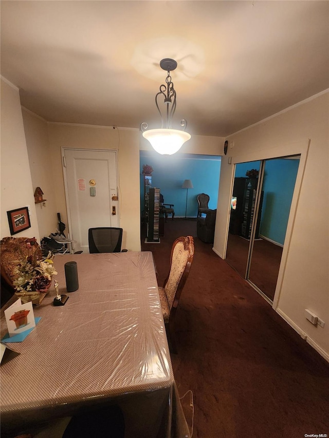 view of carpeted dining area