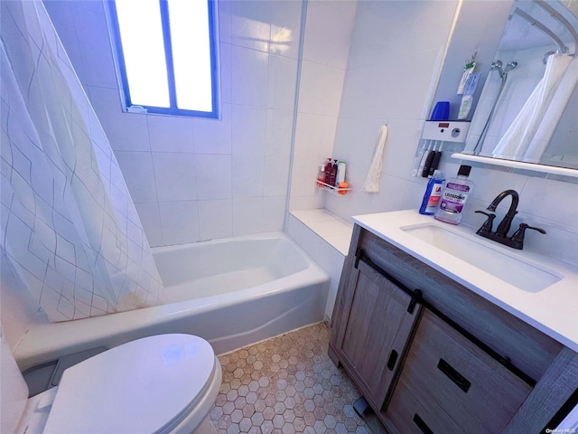 full bathroom featuring tasteful backsplash, tile patterned flooring, toilet, vanity, and tile walls