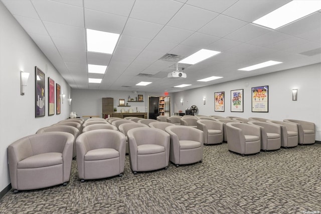 cinema room with a drop ceiling