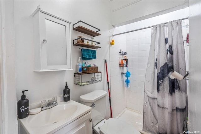 bathroom featuring a shower with curtain, vanity, and toilet