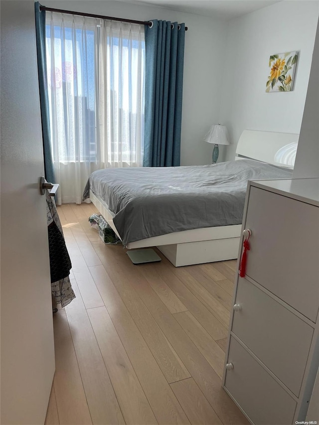 bedroom featuring light hardwood / wood-style floors