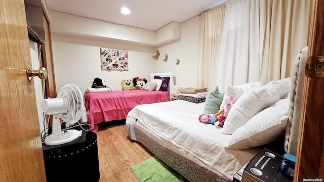 bedroom featuring hardwood / wood-style floors