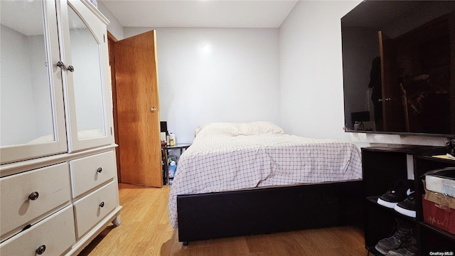 bedroom featuring light hardwood / wood-style flooring