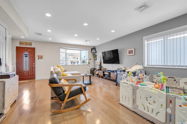 living room featuring light hardwood / wood-style floors