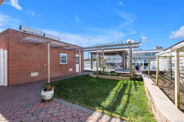 view of yard featuring a pergola and a patio area