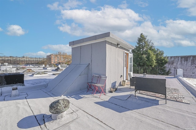 view of outbuilding featuring an outdoor living space