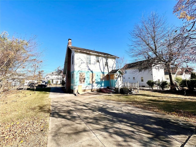 exterior space with a front lawn