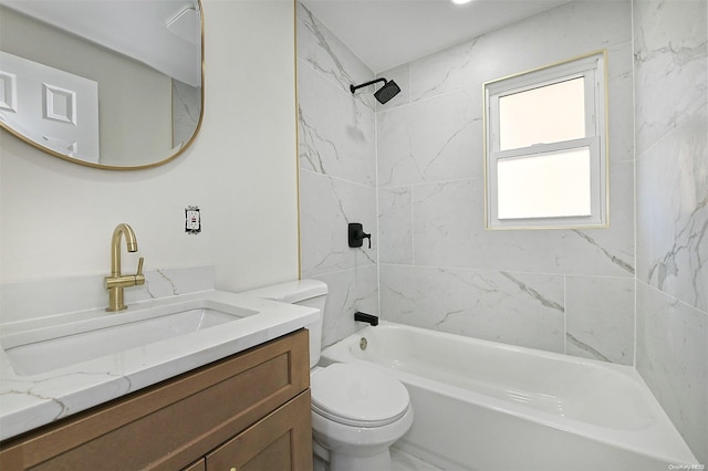 full bathroom featuring toilet, vanity, and tiled shower / bath combo