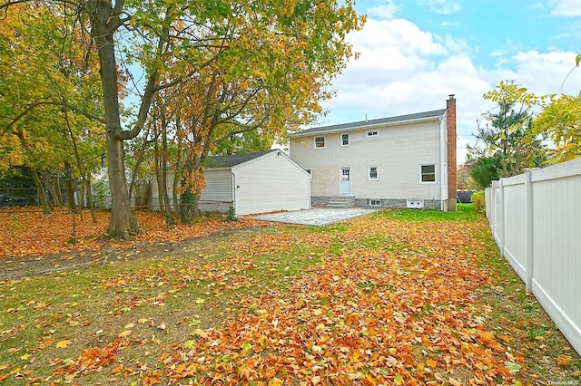 back of property with a patio area