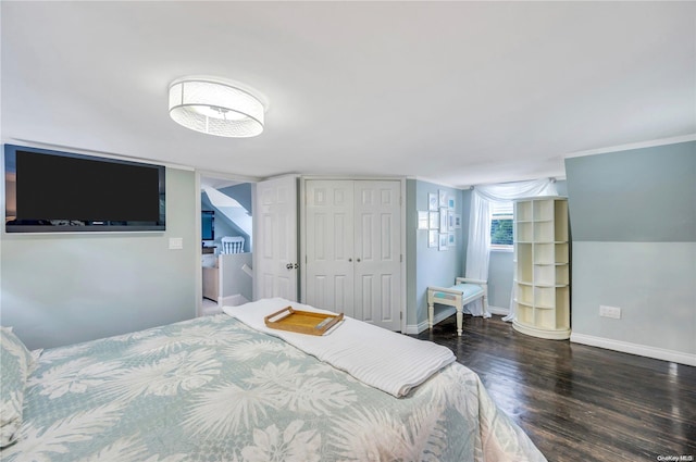 bedroom featuring dark hardwood / wood-style flooring