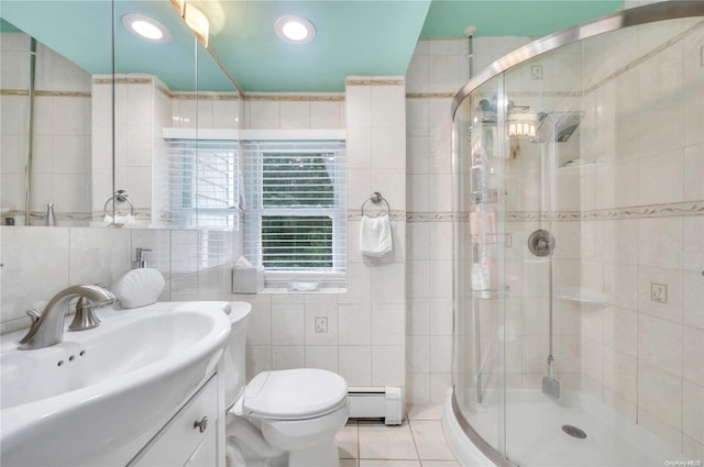 bathroom featuring an enclosed shower, tile patterned floors, baseboard heating, and tile walls