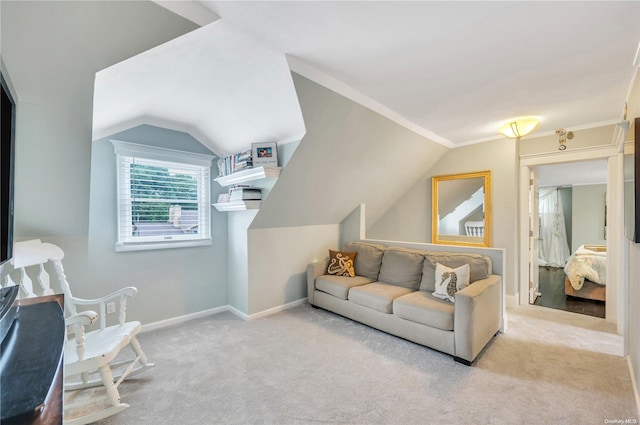 carpeted living room featuring vaulted ceiling