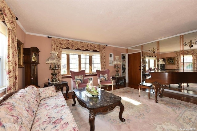 living room with a textured ceiling, wood-type flooring, and crown molding