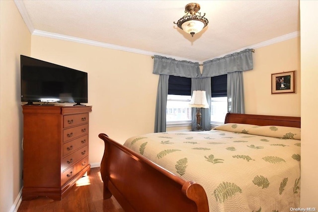 bedroom featuring hardwood / wood-style flooring and ornamental molding