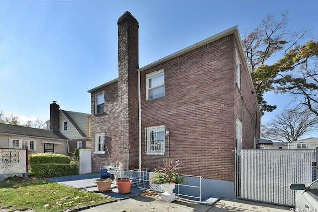 view of home's exterior with a patio