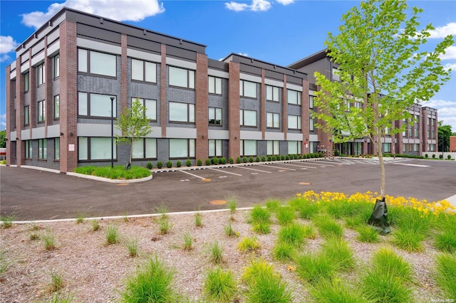 218 Middle Neck Rd Unit 301, Great Neck, NY 11021 - view of building exterior with uncovered parking